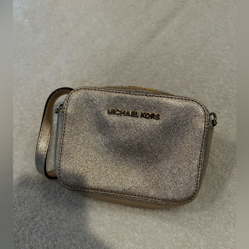 Michael Kors Gold Crossbody Bag with adjustable chain accent and wallet insert.